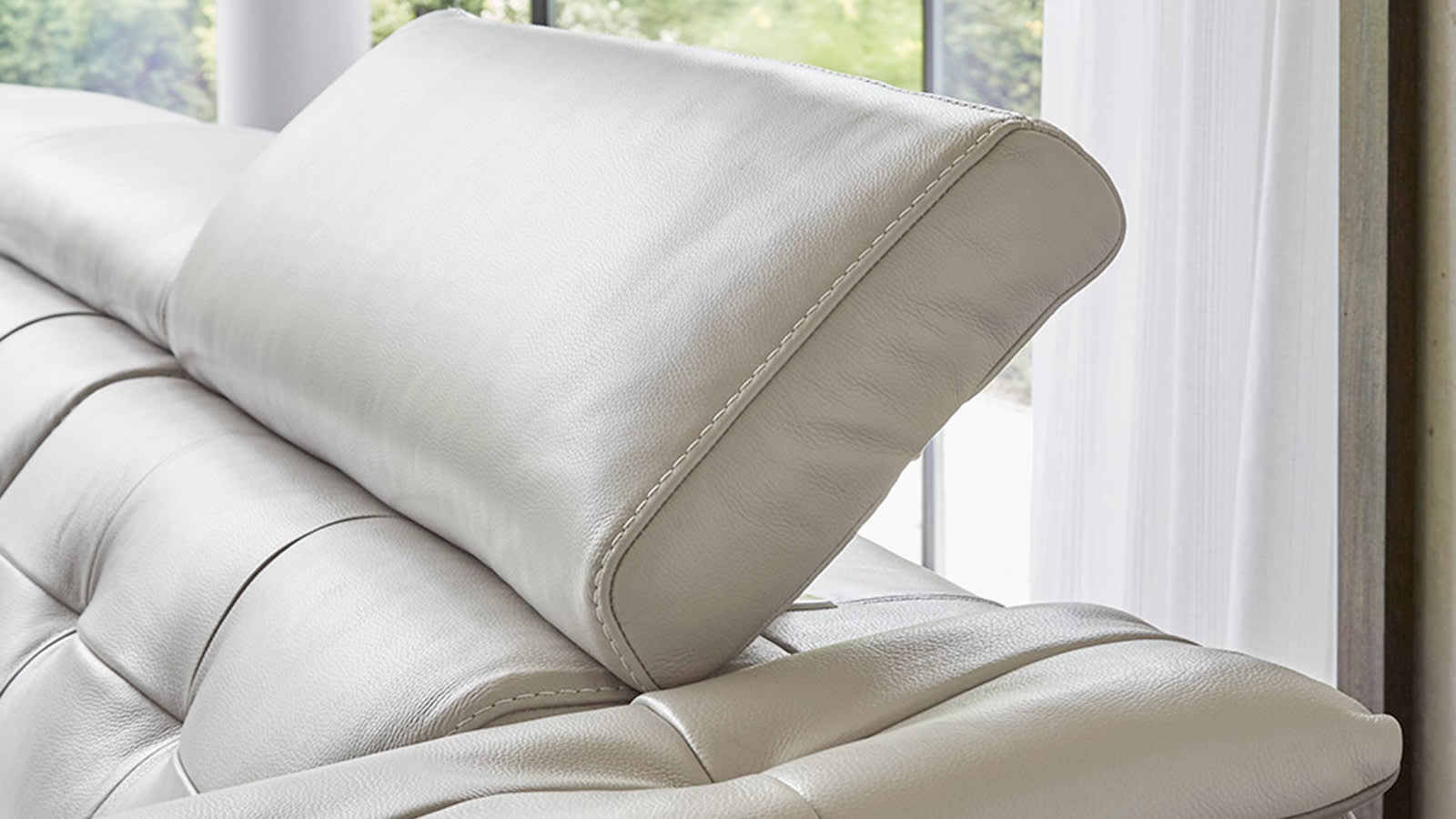 White leather recliner sofa