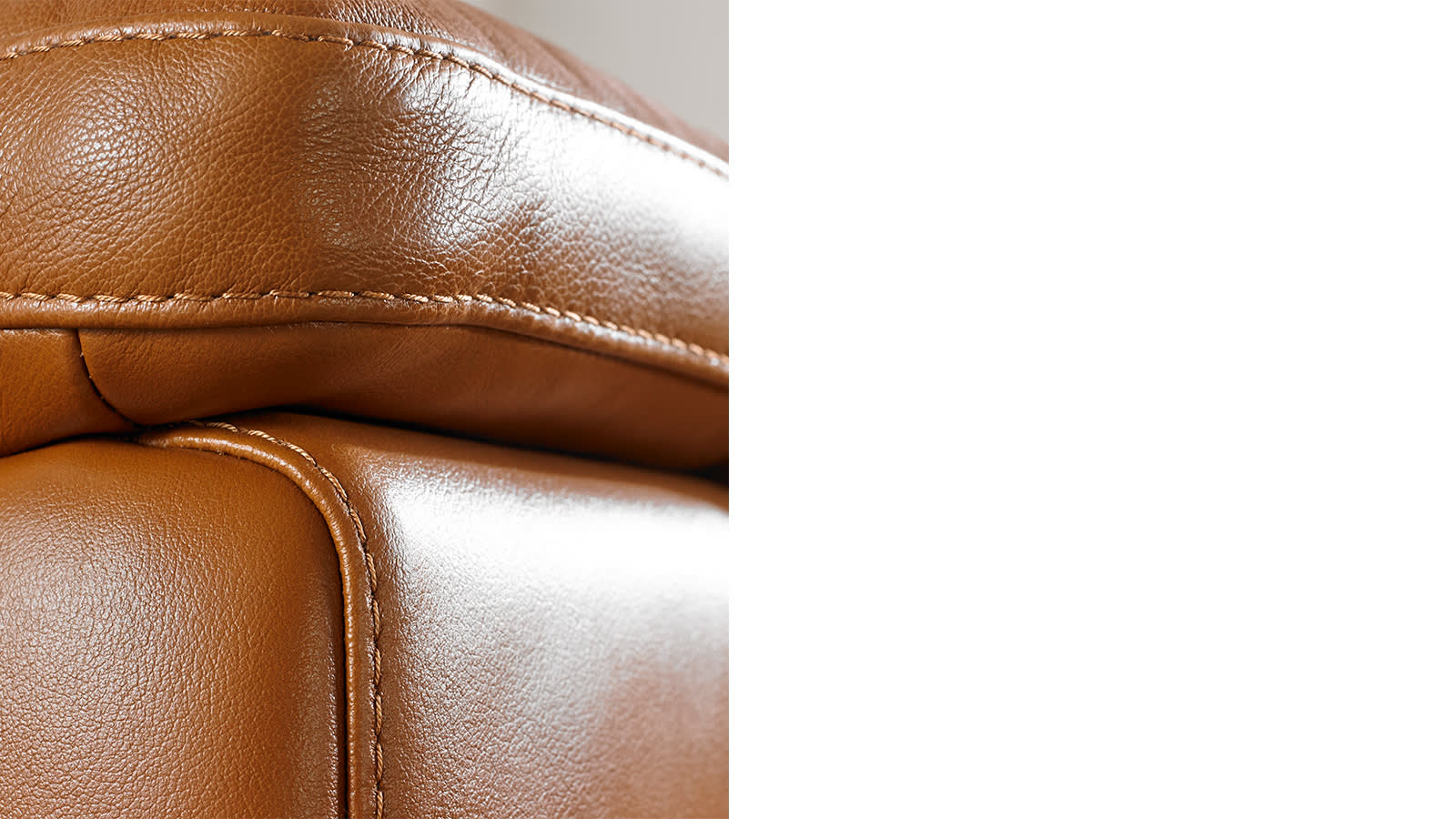 Brown leather stitched sofa