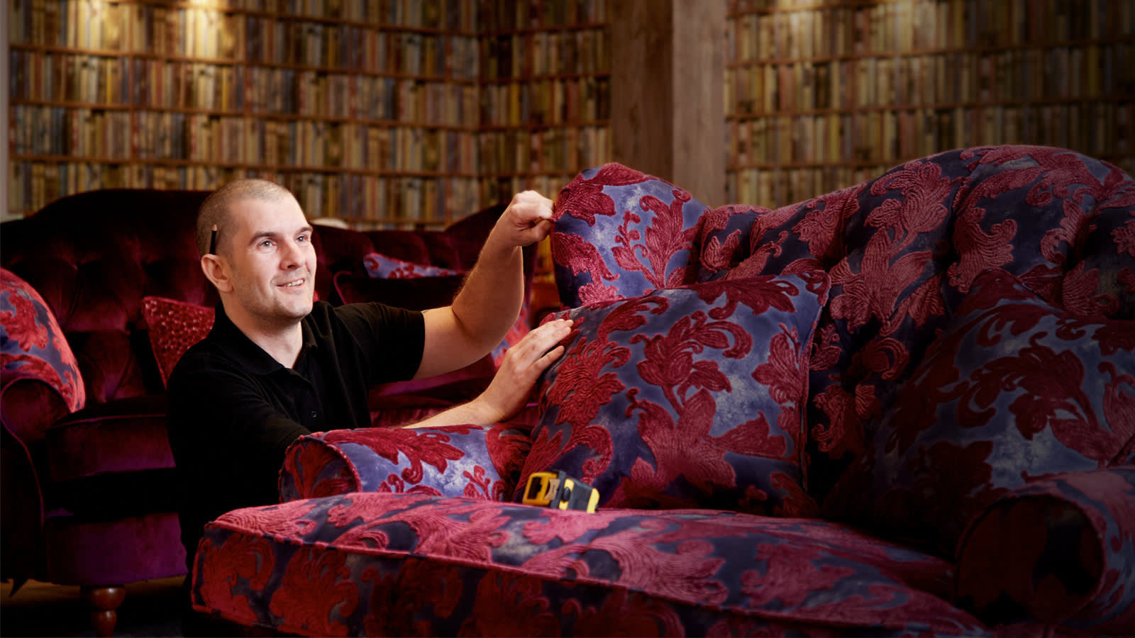 Sofologist repairing sofa