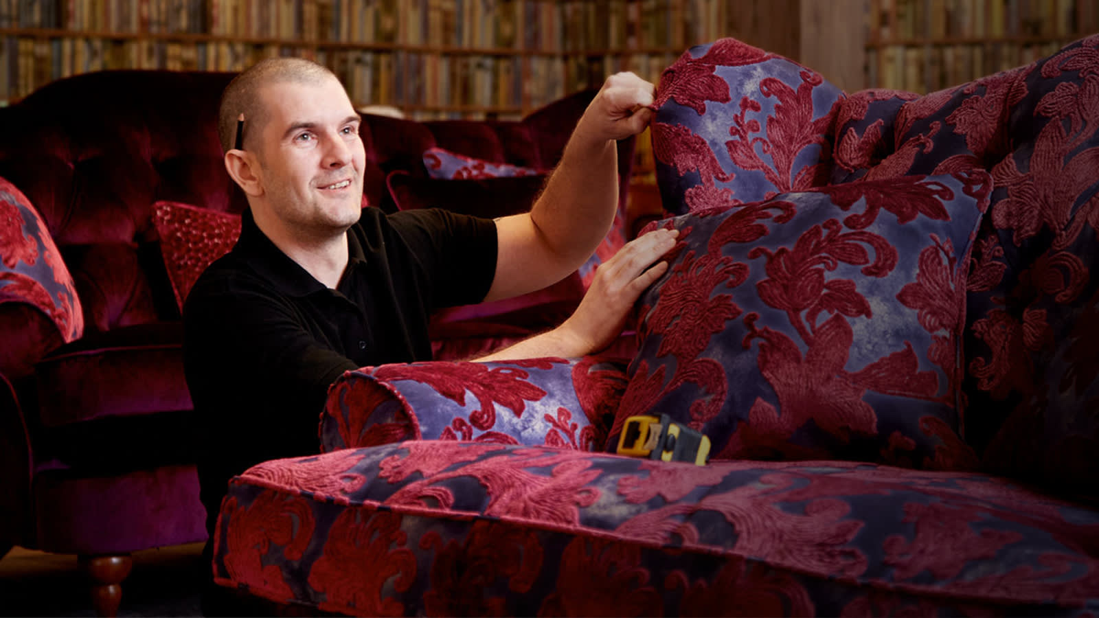 Sofologist repairing sofa