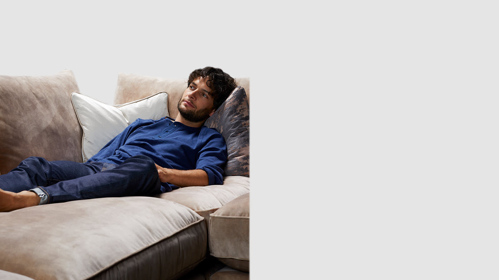 Man relaxing on the Emperor sofa