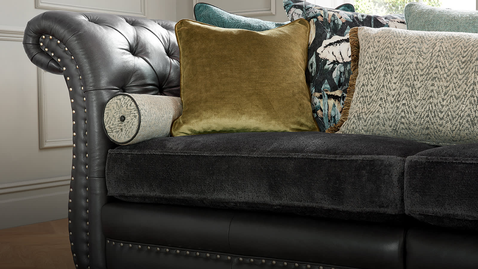 Sofology Persia dark leather and fabric sofa