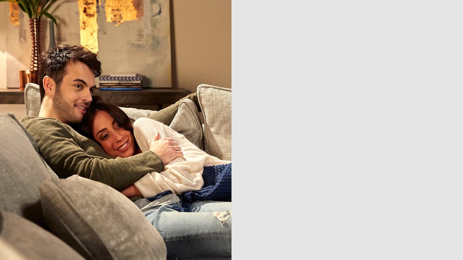 Couple sitting on sofa