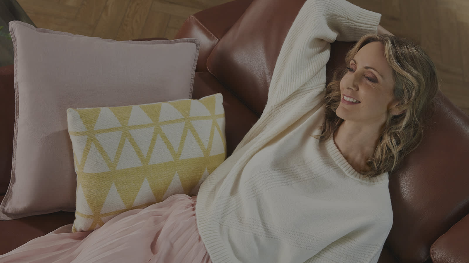 Woman relaxing on a sofa
