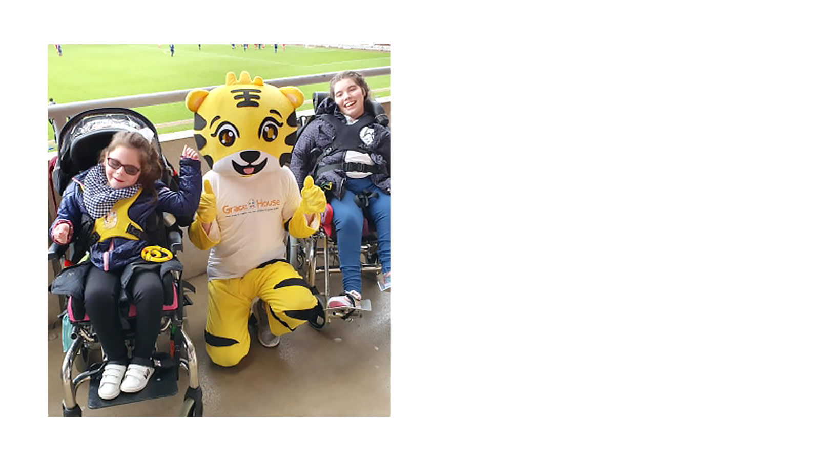 Children with a tiger mascot