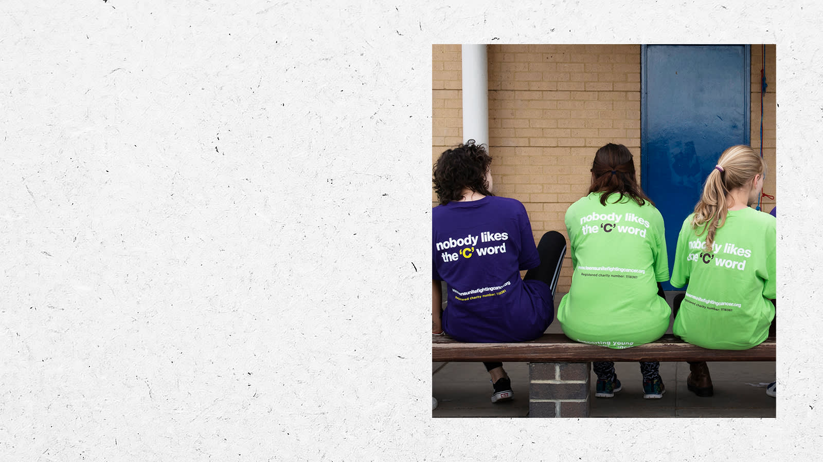 People sitting on a bench wearing Teens Unite tshirts