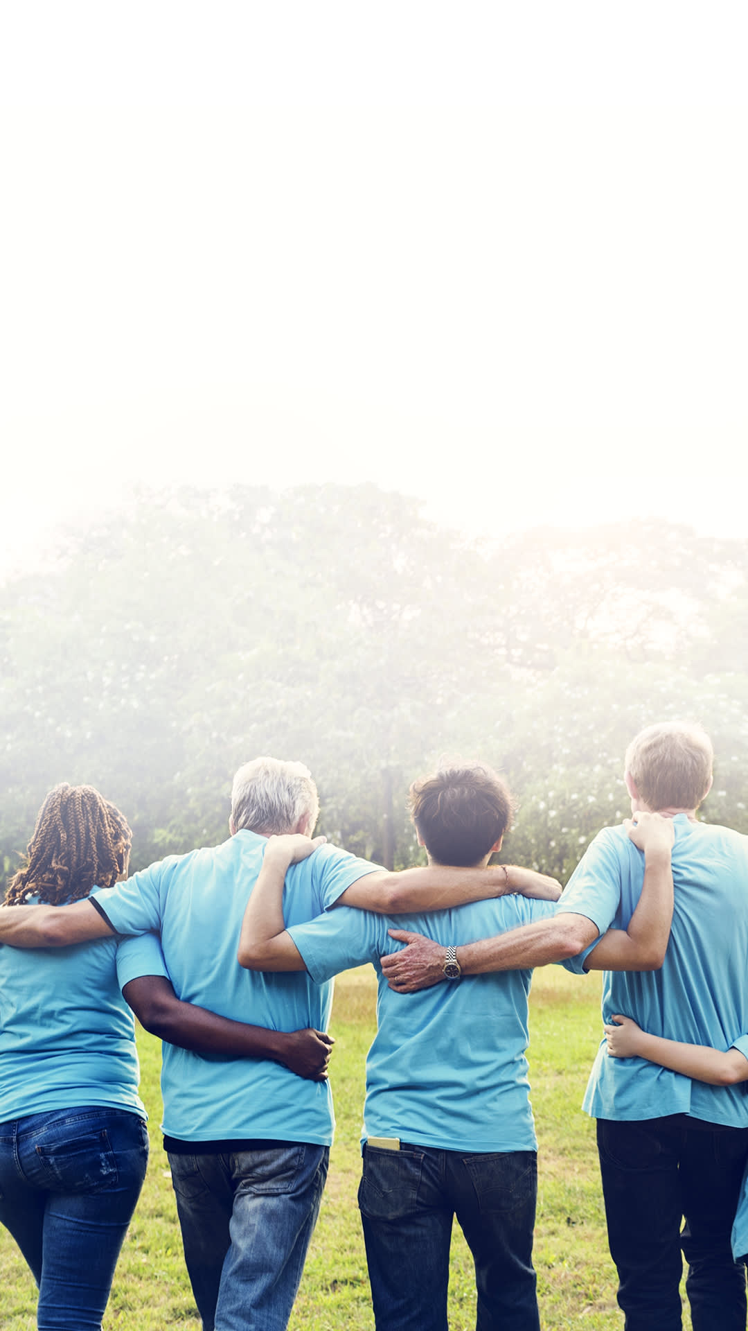 Line of people with arms around each others shoulders