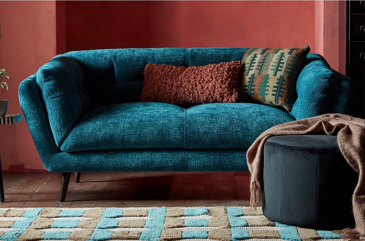 Dark blue coloured sofa