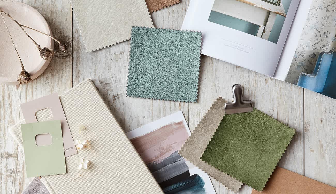 Fabrics on the floor in pastel colours